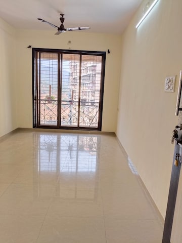 Living Room in 2 BHK Apartment at Hyde Park CHS, Kharghar – for Rent