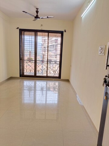Living Room in 2 BHK Apartment at Hyde Park CHS, Kharghar – for Rent