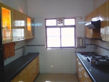 Kitchen in 2 BHK Apartment at Swaraj Upasana Apartment, Khar West – for Rent