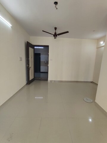Living Room in 2 BHK Apartment at Hyde Park CHS, Kharghar – for Rent