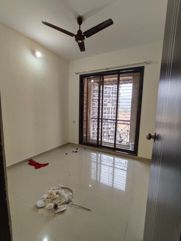 Bedroom in 2 BHK Apartment at Hyde Park CHS, Kharghar – for Rent