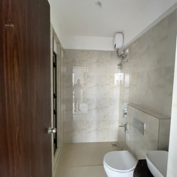 Bathroom in 2 BHK Apartment at Raymond Ten X Habitat, Swastik Garden – for Rent