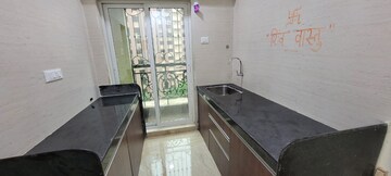 Kitchen in 1.5 BHK Apartment at Sheth Vasant Lawns, Laxmi Nagar – for Rent
