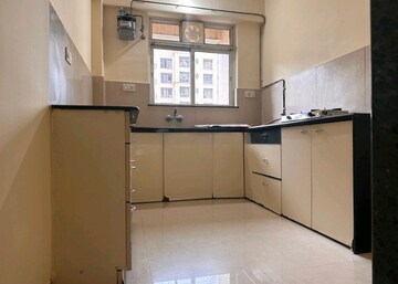 Kitchen in 1 BHK Apartment at Bhoomi Acres, Waghbil – for Sale