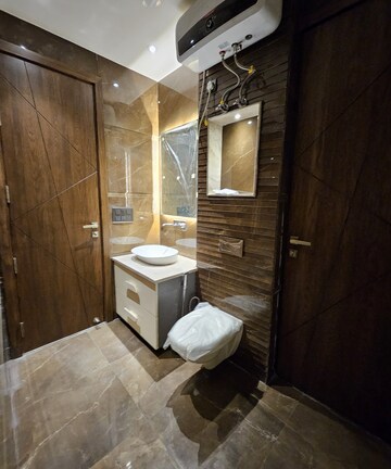 Bathroom in 4 BHK Builder Floor at Ansal Sushant Lok I, Sector 43 – for Rent