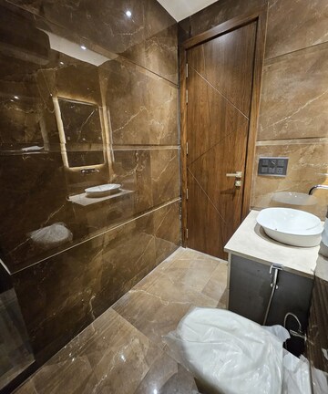 Bathroom in 4 BHK Builder Floor at Ansal Sushant Lok I, Sector 43 – for Rent