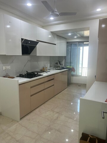 Kitchen in 4 BHK Apartment at Oberoi Realty Esquire, Goregaon East – for Rent