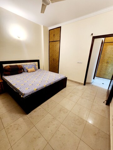 Bedroom in 3 BHK Builder Floor at Ansal Sushant Lok I, Sector 43 – for Rent