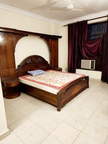 Bedroom in 3 BHK Builder Floor at Ansal Sushant Lok I, Sector 43 – for Rent