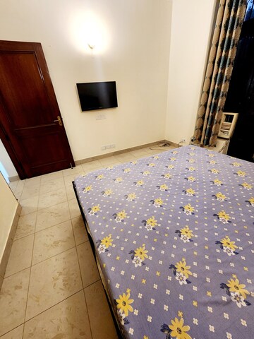 Bedroom in 3 BHK Builder Floor at Ansal Sushant Lok I, Sector 43 – for Rent