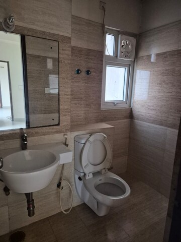 Bathroom in 4 BHK Apartment at Sunshine Helios, Sector 78 – for Rent