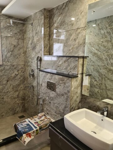Bathroom in 4 BHK Builder Floor at Ansal Sushant Lok I, Sector 43 – for Rent