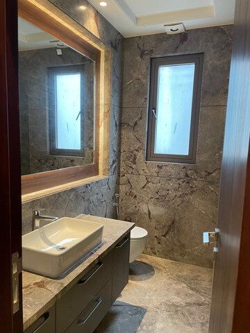 Bathroom in 3 BHK Builder Floor at Green Park Extension – for Rent