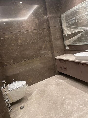 Bathroom in 3 BHK Builder Floor at Green Park Extension – for Rent