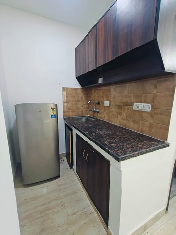 Kitchen in 1 RK Builder Floor at Ansal Sushant Lok I, Sector 43 – for Rent