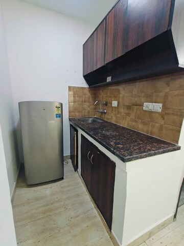 Kitchen in 1 RK Builder Floor at Ansal Sushant Lok I, Sector 43 – for Rent
