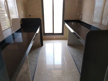 Kitchen in 2 BHK Apartment at Veera Desai Industrial Estate – for Sale