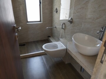 Bathroom in 2 BHK Apartment at Veera Desai Industrial Estate – for Sale