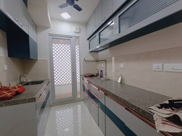 Kitchen in 2 BHK Apartment at Piramal Vaikunth, Balkum Pada – for Rent