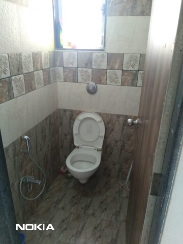 Bathroom in 2 BHK Apartment at Sai Proviso Leisure Town, Hadapsar – for Sale