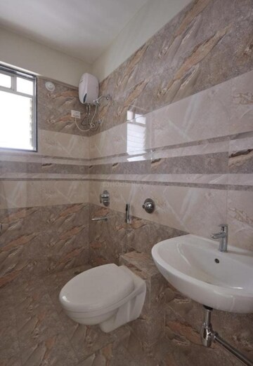 Bathroom in 2 BHK Apartment at Sai Proviso Leisure Town, Hadapsar – for Sale