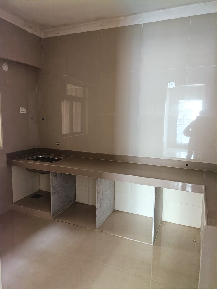 Kitchen, cosmos-horizon-phase-2 2 Bedroom 705 Sq.Ft. Apartment In Pokhran Road No 2 Thane 8105592