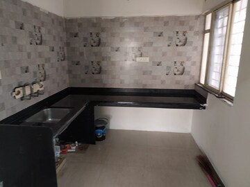Kitchen in 1 BHK Apartment at Divine Palm Springs, Wakad – for Rent