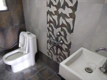 Bathroom in 1 BHK Apartment at Divine Palm Springs, Wakad – for Rent
