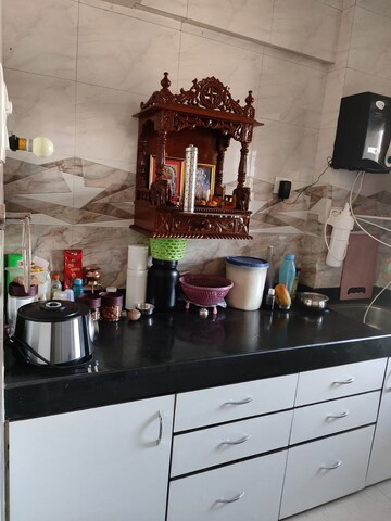 Kitchen in 1 BHK Apartment at Om Sai Enclave, Mira Road – for Sale