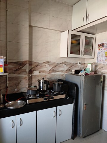 Kitchen in 1 BHK Apartment at Om Sai Enclave, Mira Road – for Sale