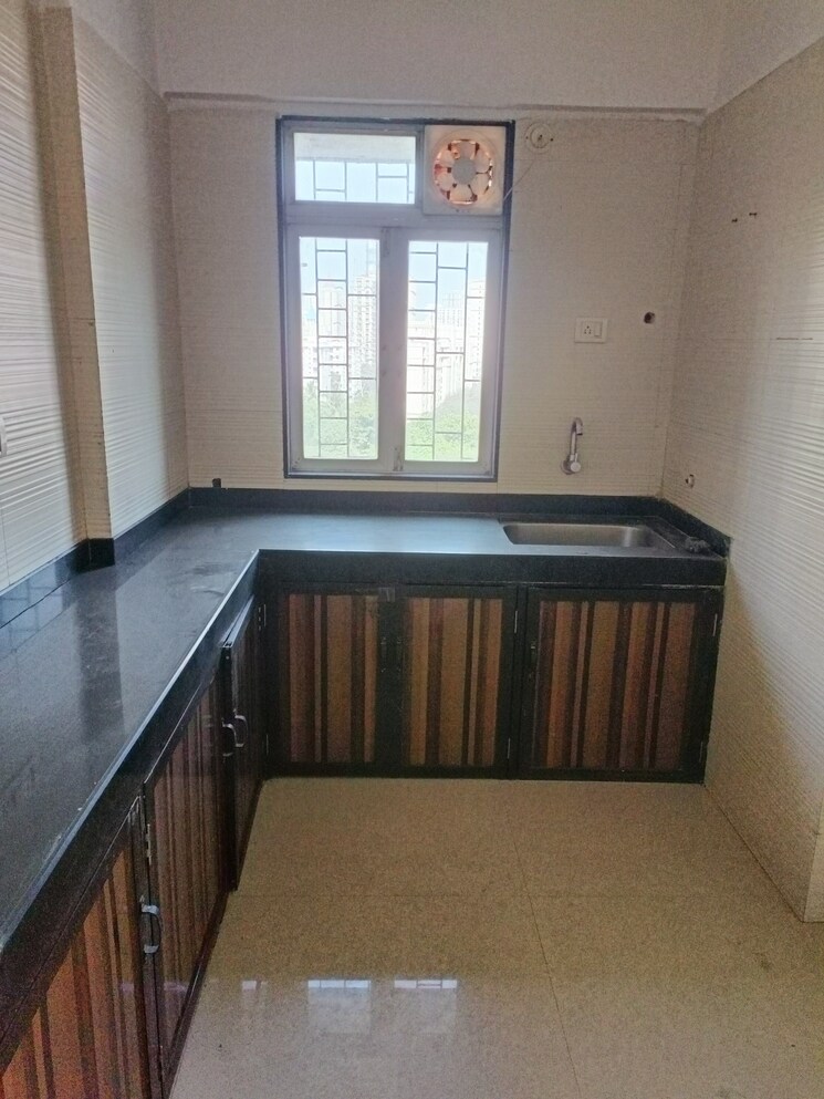 Kitchen, cosmos-classique 2 Bedroom 436 Sq.Ft. Apartment In Ghodbunder Road Thane 8105770