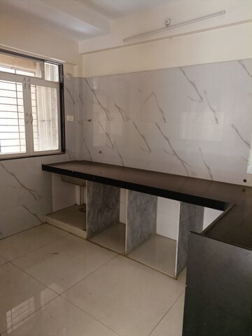 Kitchen in 2 BHK Apartment at Sanghvi Nesta, Ghodbunder Road – for Sale
