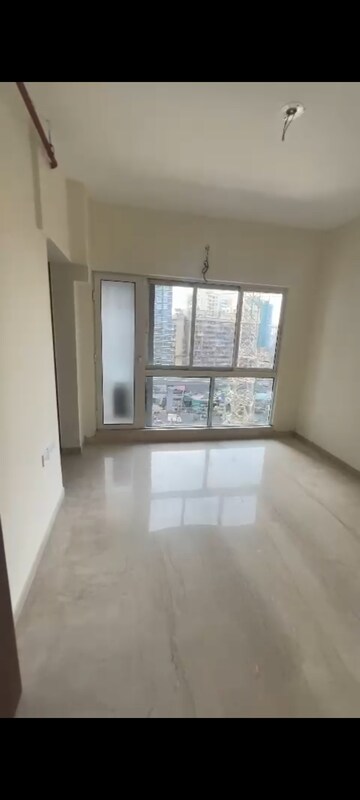 Living Room in 1 BHK Apartment at Omkar Signet, Malad East – for Rent