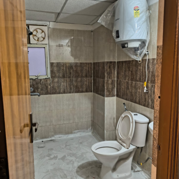 Bathroom in 3 BHK Apartment at Panchsheel Greens II, Panchsheel Green – for Rent