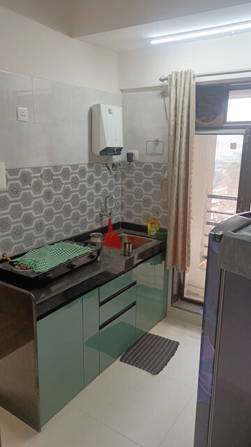 Kitchen in 1 BHK Apartment at Sanghvi Ecocity Woods, Mahajanwadi – for Rent