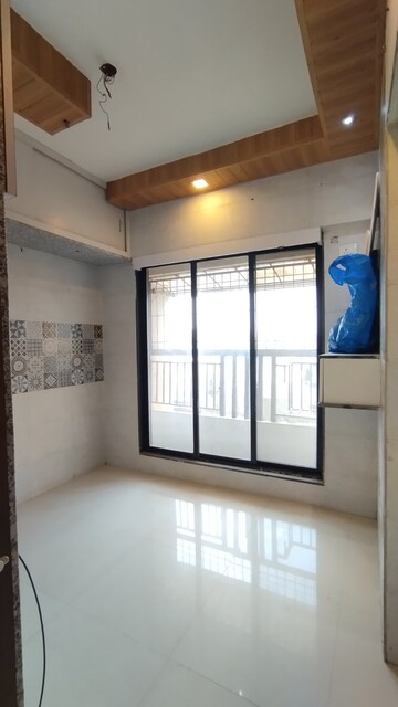 Room in 2 BHK Apartment at Raunak City Sector 4 D10, Kalyan West – for Sale