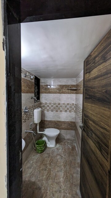 Bathroom in 1 BHK Apartment at Shree Pancham Mira Road, Mira Road – for Rent