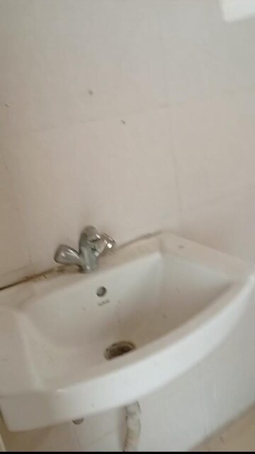 Bathroom in 2 BHK Apartment at Adore Happy Homes Grand, Sector 85 – for Sale