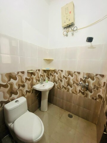Bathroom in 2 BHK Apartment at Sunny Enclave – for Rent