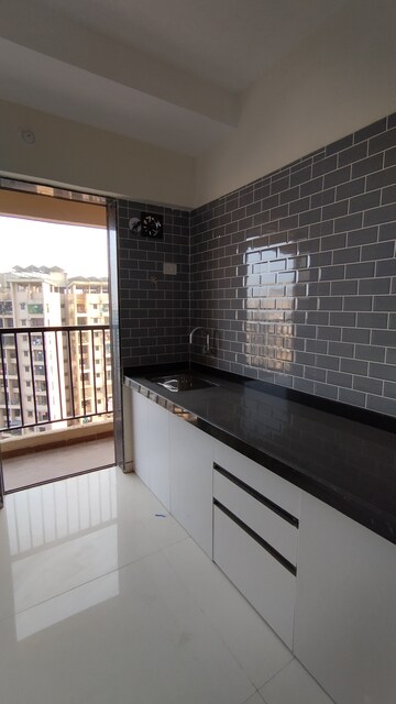 Kitchen in 1 BHK Apartment at Raunak City Sector 4, Kalyan West – for Rent