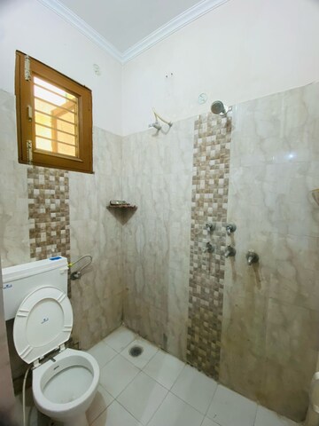 Bathroom in 2 BHK Apartment at Sunny Enclave – for Rent