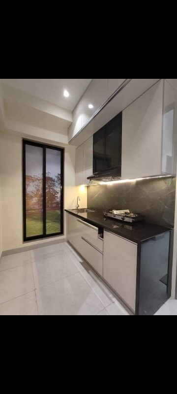 Kitchen in 2 BHK Apartment at Jeenaam Adiraj Ascent , Nalasopara East – for Rent