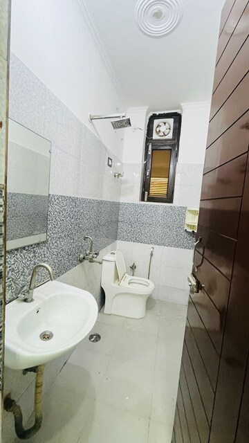 Bathroom in 1 BHK Apartment at Risland Sky Mansion, Chattarpur – for Rent