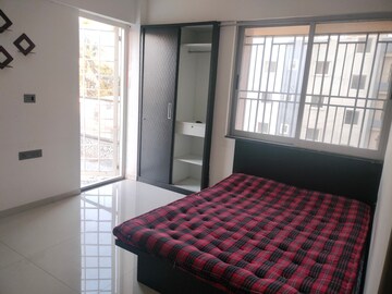 Bedroom in 2 BHK Apartment at SM Icon 51, Wadgaon Sheri – for Rent