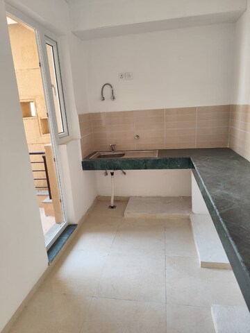 Kitchen in 4 BHK Apartment at BPTP Parkland Pride, Sector 77 – for Sale