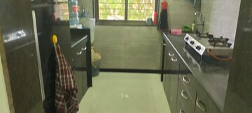 Kitchen in 2 BHK Apartment at Cosmos Habitat, Majiwada – for Rent