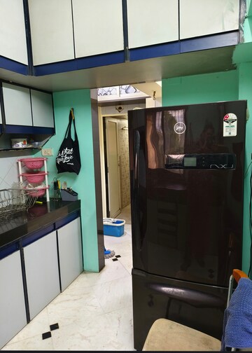 Kitchen in 2 BHK Apartment at Shivlok CHS Majiwada, Majiwada – for Rent