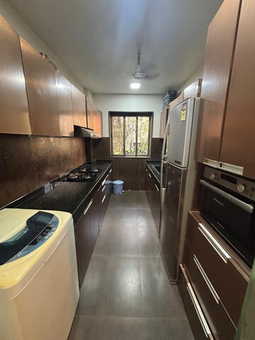 Kitchen in 1 BHK Apartment at Tideways Society, Bandra West – for Rent