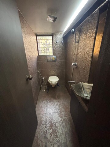 Bathroom in 1 BHK Apartment at Tideways Society, Bandra West – for Rent