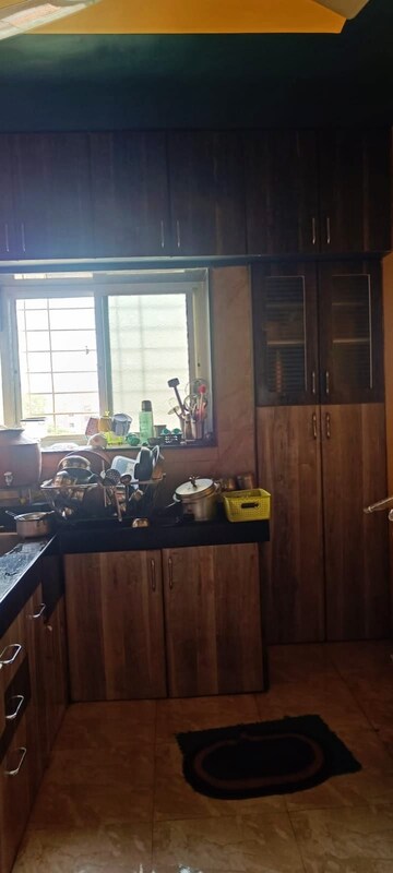 Kitchen in 2 BHK Apartment at Punyadham Society, Wadgaon Sheri – for Sale